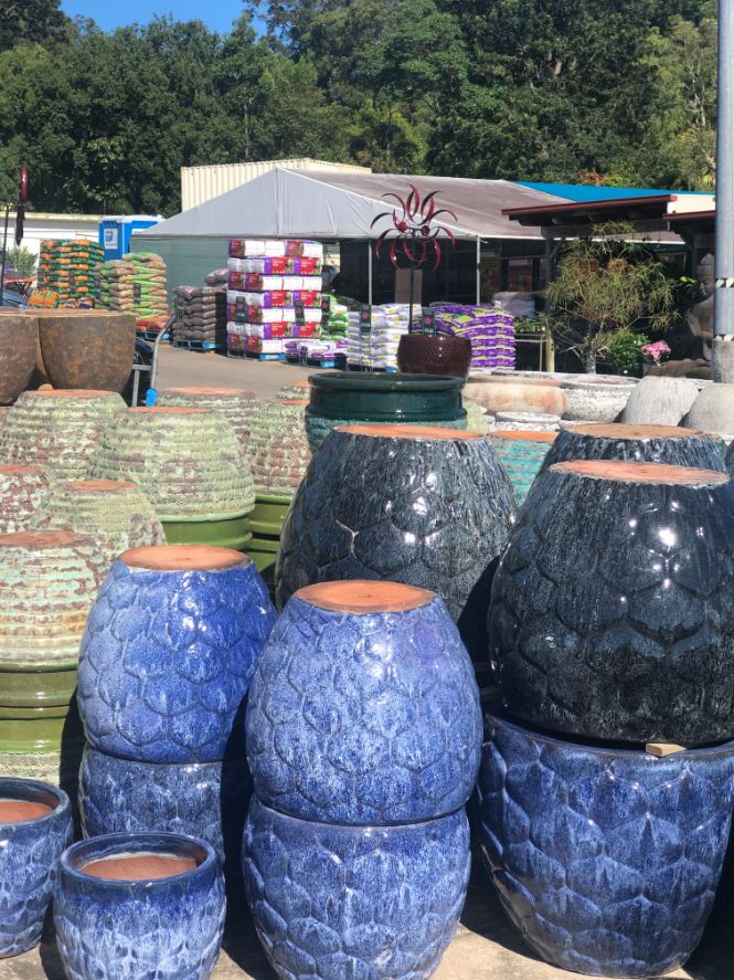 Stacked Large Pots at the Nursery - Plants in QLD